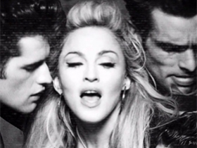 Watch Madonna dancing with shirtless males in her clip Girl Gone Wild